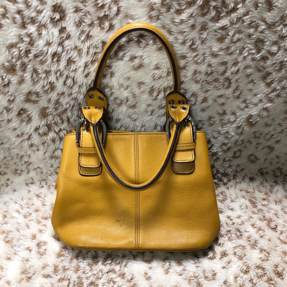 Tignanello mustard yellow leather handbag.